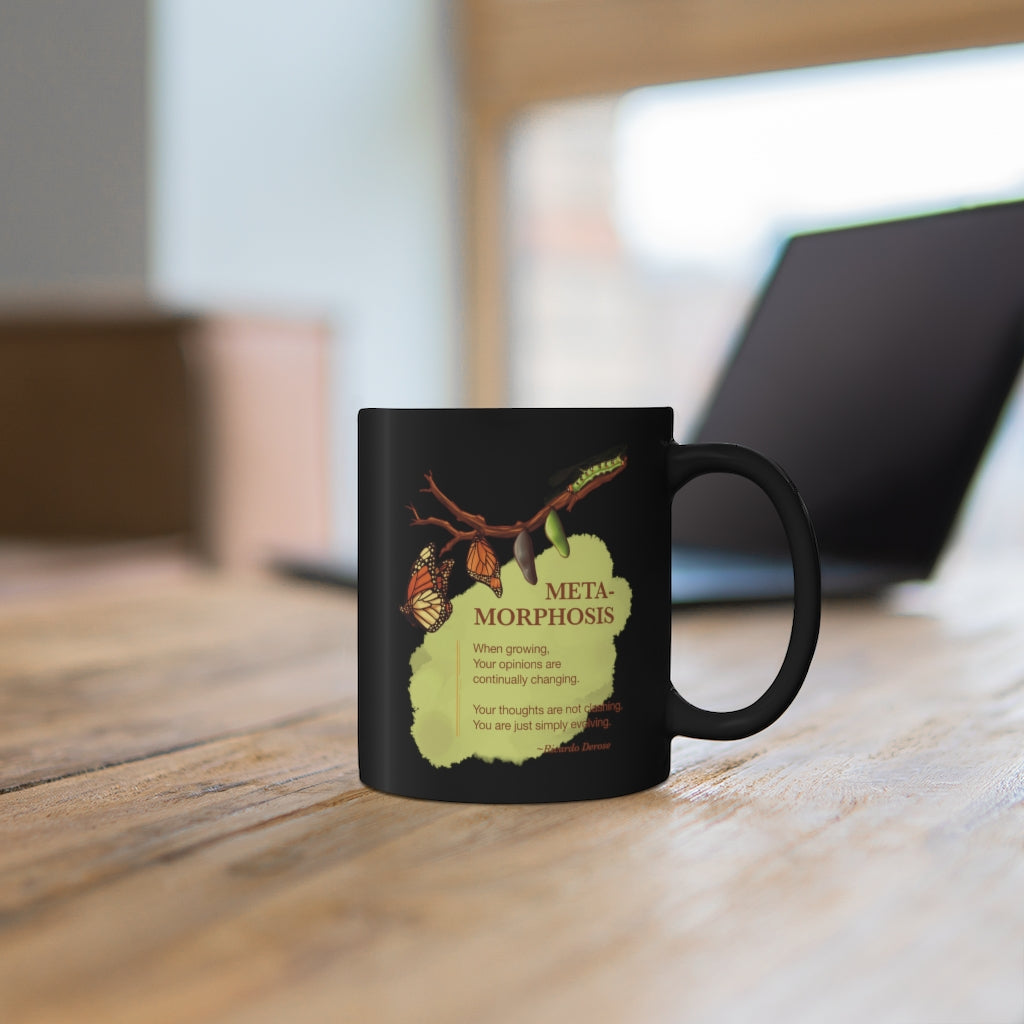 Black and Yellow Coffee Layer's Mug behind Laptop by Ricardo Derose